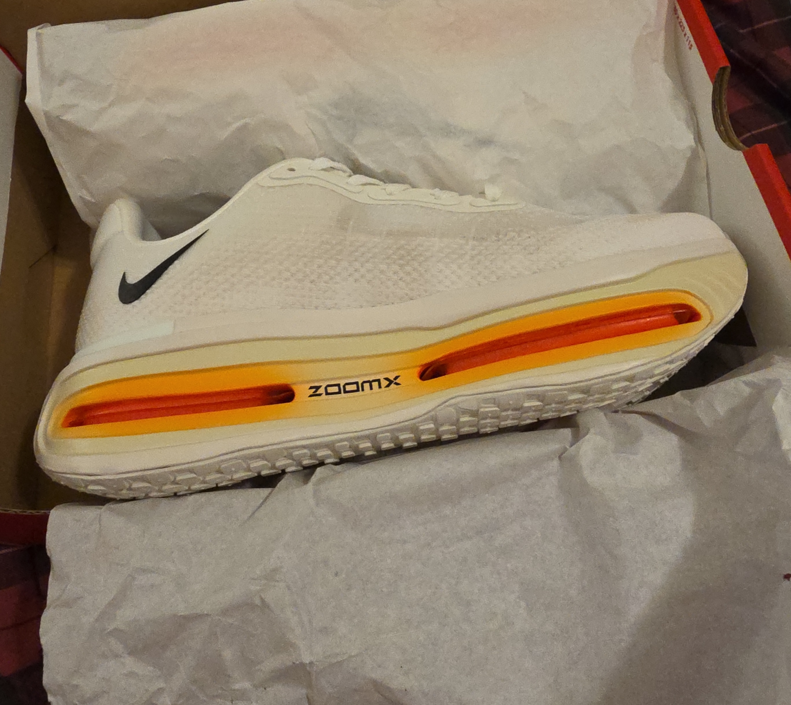 Nike Men’s White Zoomx Running Shoe With Orange Accent